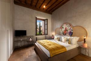 Palm Suites - Small Luxury Hotels of the World客房内的一张或多张床位