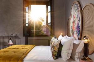 Palm Suites - Small Luxury Hotels of the World客房内的一张或多张床位
