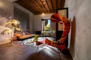 Palm Suites - Small Luxury Hotels of the World的休息区
