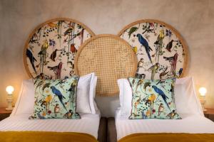 Palm Suites - Small Luxury Hotels of the World客房内的一张或多张床位