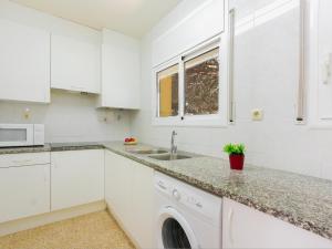 A kitchen or kitchenette at Apartment Velazquez-2 by Interhome Még 17 kép