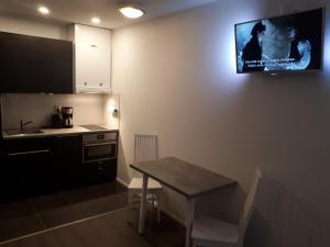 TV tai viihdekeskus majoituspaikassa Vuokatti Slope Suite