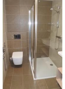 Kúpeľňa v ubytovaní Apartmán v Starej Lesnej s balkónom