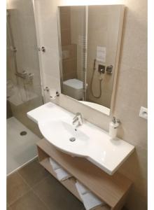 Kúpeľňa v ubytovaní Apartmán v Starej Lesnej s balkónom