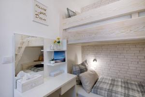 Posteľ alebo postele v izbe v ubytovaní Familien Appartement "Ostsee Perle" neu & modern