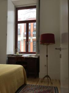 TV a/nebo společenská místnost v ubytování Amélia, cosy apartment, 50m2, Oporto Downtown