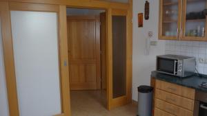 Kuchyňa alebo kuchynka v ubytovaní Apartmány Gráf