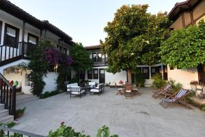 A garden outside Villa Konak Hotel