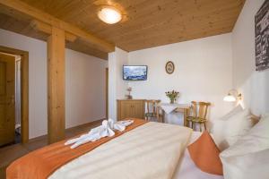 Postel nebo postele na pokoji v ubytování Hinterlechnerhof