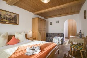 Postel nebo postele na pokoji v ubytování Hinterlechnerhof