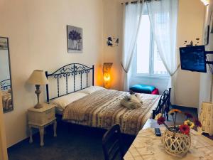 Katil atau katil-katil dalam bilik di Cuore di Testaccio Apartment
