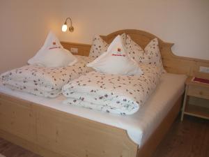 Säng eller sängar i ett rum på Kompatscherhof