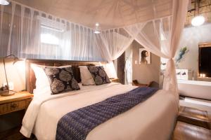 Katil atau katil-katil dalam bilik di Naledi Lodges