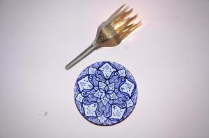 a fork and a plate with a mandala on it at Riad Khouloud in Fez