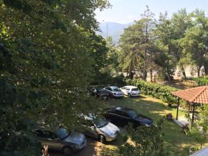 a group of cars parked in a parking lot at Litsa Haus Estate Residences & Suites - Adults Only & Kids 12 Plus- in Asprovalta +83 photos
