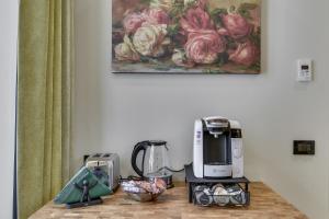 Villa Erizio, a bucolic and urban break的咖啡和沏茶工具