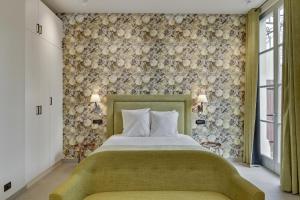 Villa Erizio, a bucolic and urban break客房内的一张或多张床位