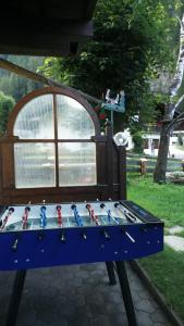 a table with a game of chess on it at Pension & Appartament Anna in Predoi