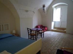 Postel nebo postele na pokoji v ubytování B&b Il Cortile + 9 fotografií