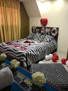 Кровать или кровати в номере Las Rocas Hostal