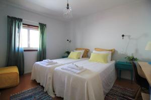 Voodi või voodid majutusasutuse Cabedelo Spot - Beachside Vacations toas