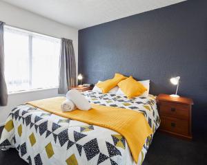 Postel nebo postele na pokoji v ubytování Aotea Motel