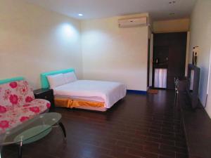 Katil atau katil-katil dalam bilik di Ivan Garden B&B