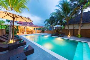 Bazén v ubytování Alamdini Resort Ubud nebo v jeho okolí