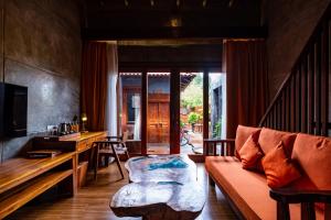 TV a/nebo společenská místnost v ubytování Ipoh Bali Hotel