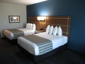 מיטה או מיטות בחדר ב-Best Western Plus Medical Center