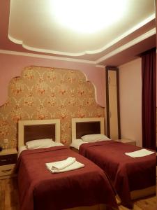 Postel nebo postele na pokoji v ubytování B&B Europa Hotel