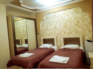 Postel nebo postele na pokoji v ubytování B&B Europa Hotel