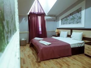 Postel nebo postele na pokoji v ubytování B&B Europa Hotel
