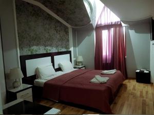 Postel nebo postele na pokoji v ubytování B&B Europa Hotel