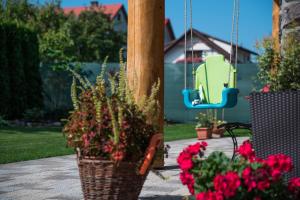 A garden outside Guest House Privat Pod Lesom