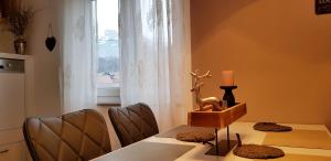 Posedenie v ubytovaní Ferienwohnung Loserblick