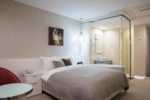 Postel nebo postele na pokoji v ubytování Hotel Mate Bundang + 37 fotografií