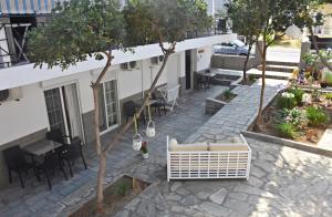 an overhead view of a patio of a building at Vicky Studios in Myrina