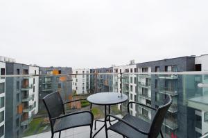 Balkon lub taras w obiekcie Premium in Novum City Center near the train station by Sun & Snow