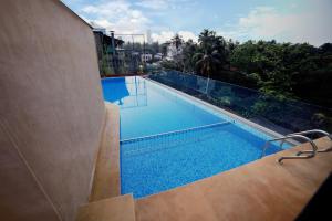 The swimming pool at or close to YASH INTERNATIONAL