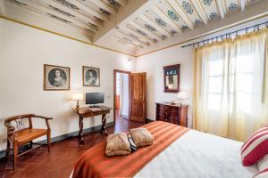 Posteľ alebo postele v izbe v ubytovaní Relais Vignale & Spa
