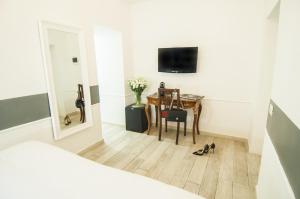 TV a/nebo společenská místnost v ubytování Ripetta Rooms