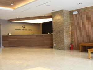 a lobby of a hotel with a reception desk at Central Tourist Hotel in Seoul