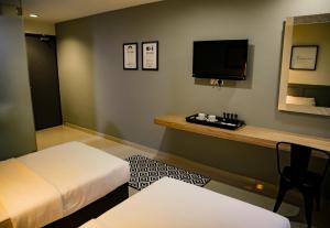 TV a/nebo společenská místnost v ubytování Mars Hotel