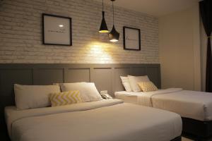 Postel nebo postele na pokoji v ubytování Mars Hotel
