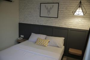 Postel nebo postele na pokoji v ubytování Mars Hotel