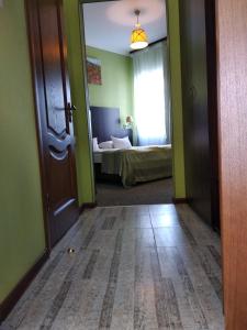 Postel nebo postele na pokoji v ubytování 12 Months Mini Hotel
