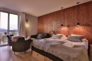 Een bed of bedden in een kamer bij Bergshotellet