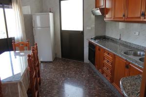 Dapur atau dapur kecil di Apartamentos Casa Gil