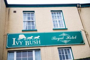 a sign for a royal halili iv brush on a building at Ivy Bush Royal Hotel by Compass Hospitality in Carmarthen